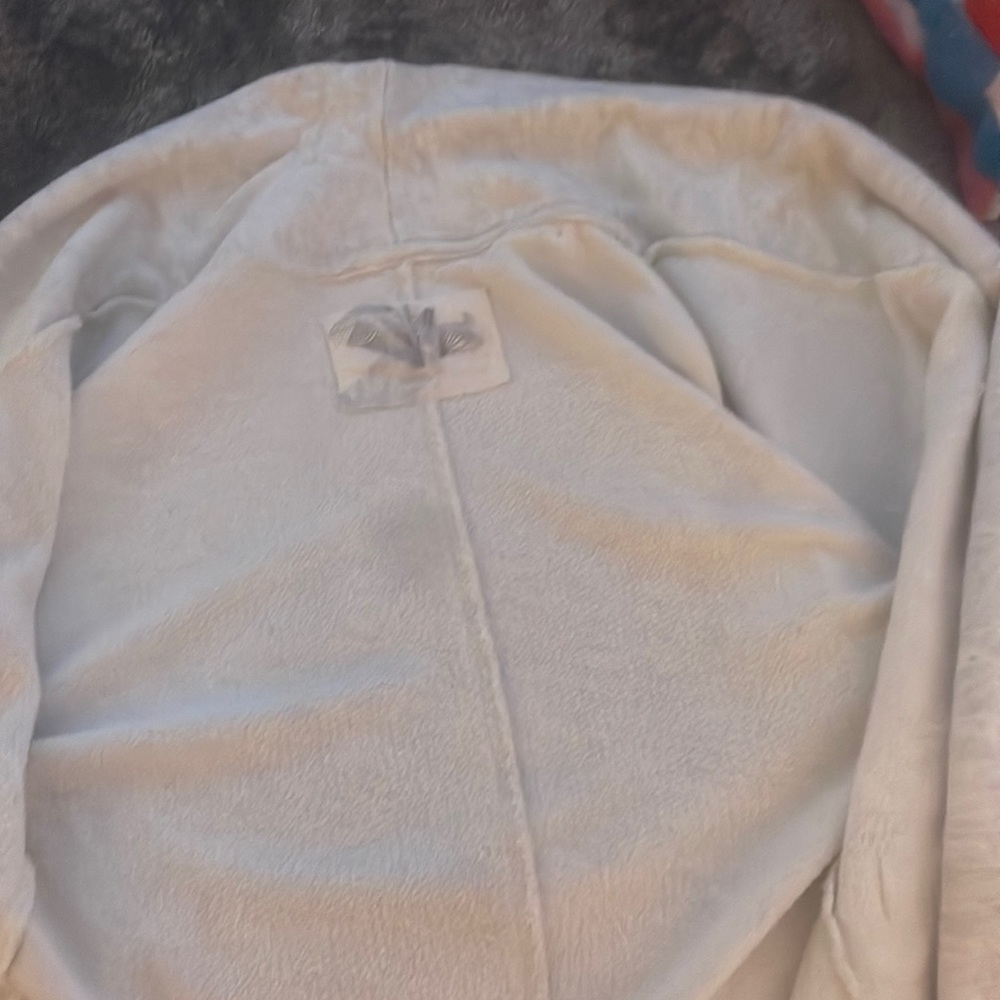 A grey jacket with Pockets